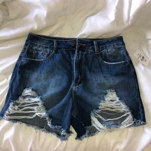 Refuge high-rise dark wash distressed denim!